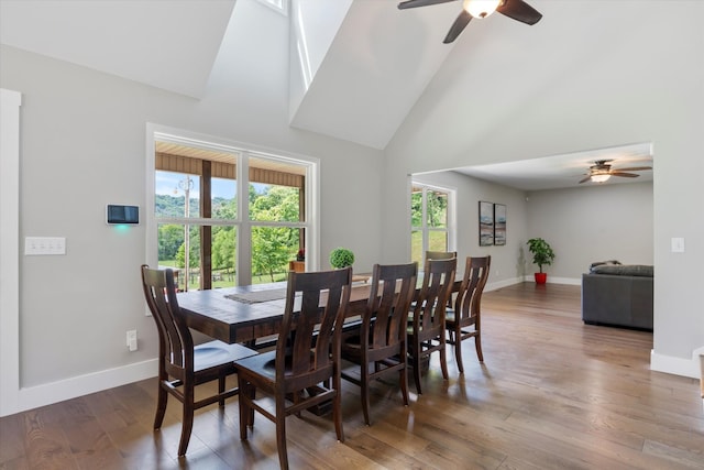593 Gaulden Hollow Rd, Lafayette, TN 37083 - dining area featuring ceiling fan, high vaulted ceiling, wood finished floors, and baseboards