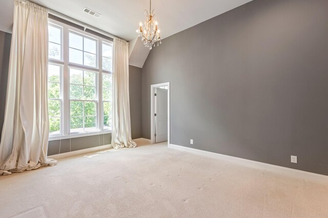 3692 Auburn Ln, Nashville, TN 37215 - carpeted spare room featuring a chandelier, baseboards, and vaulted ceiling