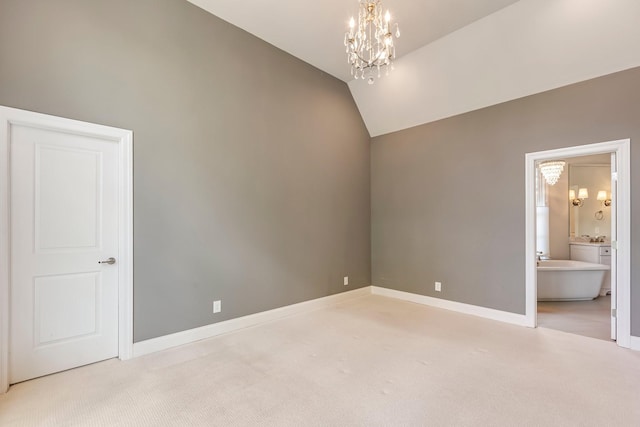 3692 Auburn Ln, Nashville, TN 37215 - unfurnished bedroom with light carpet, a chandelier, lofted ceiling, baseboards, and connected bathroom
