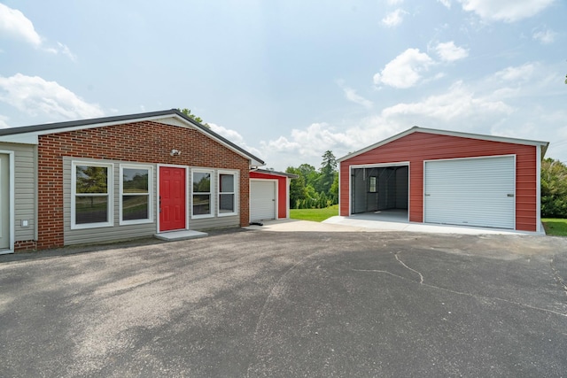 82 Drake And Shockley St, Spencer, TN 38585 - view of front of property with a garage and an outdoor structure