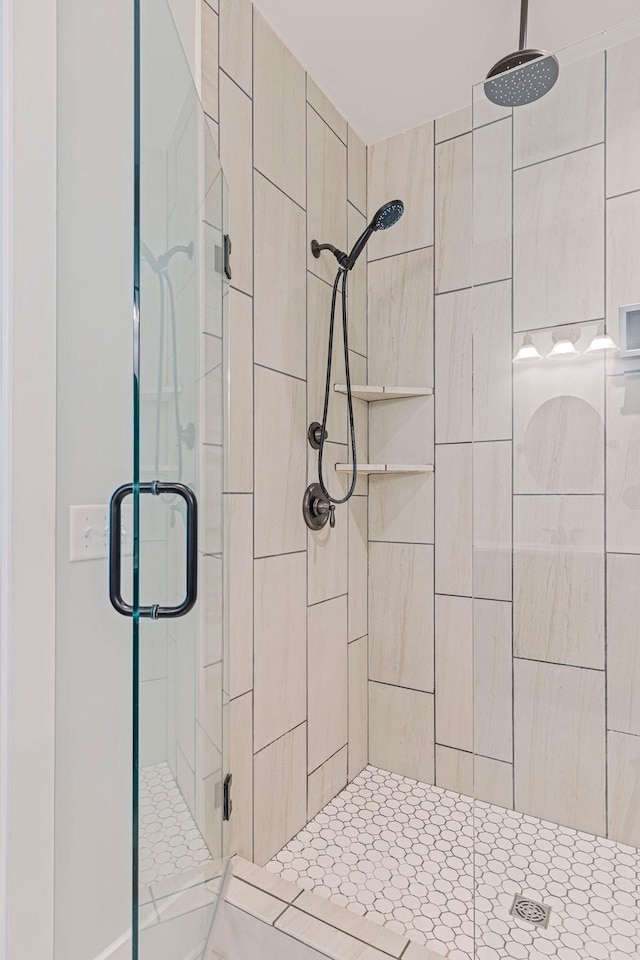 bathroom featuring a stall shower