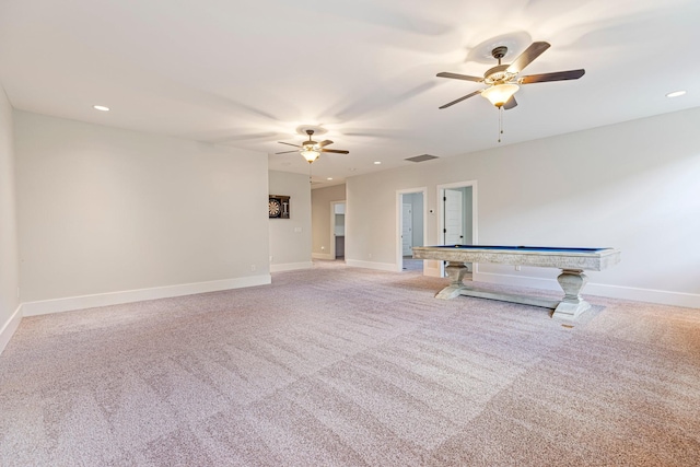 unfurnished living room with a ceiling fan, light carpet, recessed lighting, and baseboards
