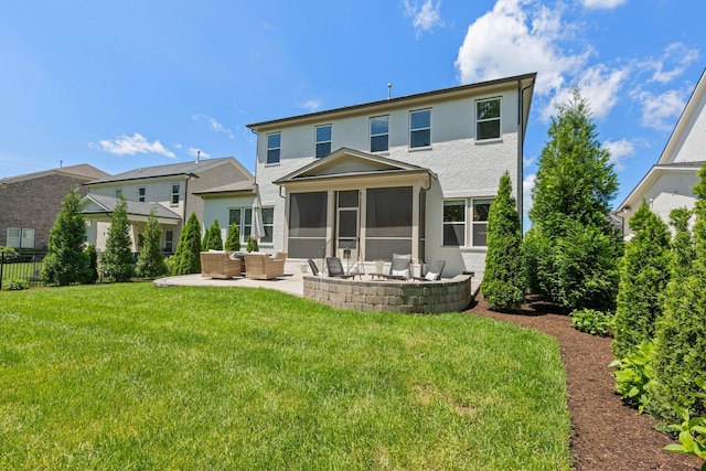 back of house with outdoor lounge area, a lawn, a patio, a sunroom, and stucco siding