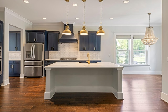 kitchen with stainless steel appliances, premium range hood, light countertops, tasteful backsplash, and pendant lighting