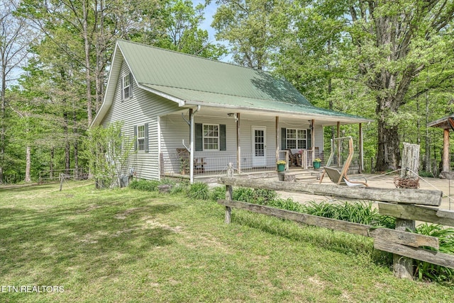 6756 Old State Highway 111, Spencer, TN 38585 - view of front facade featuring a front yard, metal roof, and covered porch