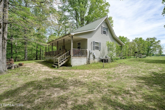 6756 Old State Highway 111, Spencer, TN 38585 - view of home's exterior with covered porch, stairs, and a yard