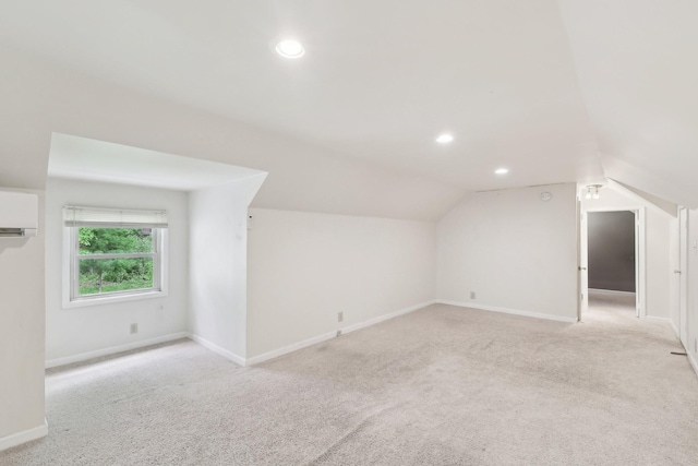 111 Lois Ln, Clarksville, TN 37043 - additional living space with vaulted ceiling, light carpet, baseboards, recessed lighting, and a wall mounted AC