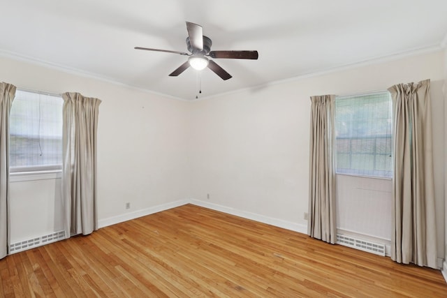 111 Lois Ln, Clarksville, TN 37043 - spare room featuring light wood-type flooring, ceiling fan, ornamental molding, and baseboards