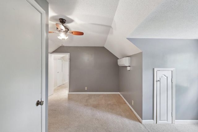 111 Lois Ln, Clarksville, TN 37043 - additional living space featuring ceiling fan, vaulted ceiling, a textured ceiling, carpet, and baseboards