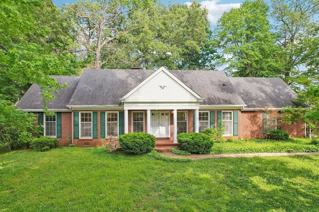 111 Lois Ln, Clarksville, TN 37043 - view of front of house featuring a front lawn, brick siding, and a shingled roof
