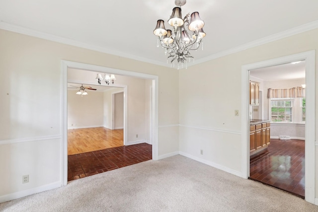 111 Lois Ln, Clarksville, TN 37043 - empty room featuring a chandelier, crown molding, baseboards, brick patterned flooring, and dark colored carpet