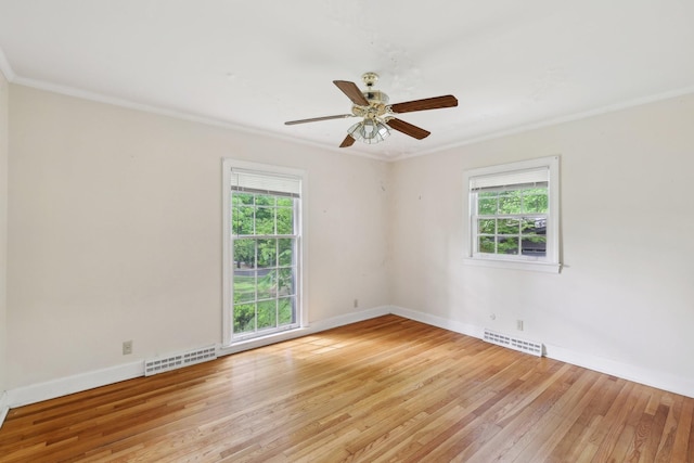 111 Lois Ln, Clarksville, TN 37043 - unfurnished room featuring ornamental molding, healthy amount of natural light, light wood finished floors, and baseboards
