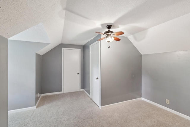 111 Lois Ln, Clarksville, TN 37043 - additional living space featuring ceiling fan, carpet flooring, lofted ceiling, a textured ceiling, and baseboards