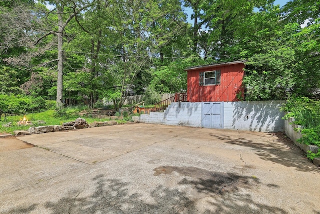 111 Lois Ln, Clarksville, TN 37043 - view of patio / terrace with stairway and an outbuilding