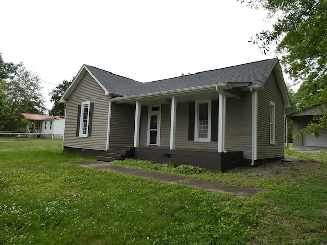 view of front of property featuring covered porch, roof with shingles, and crawl space