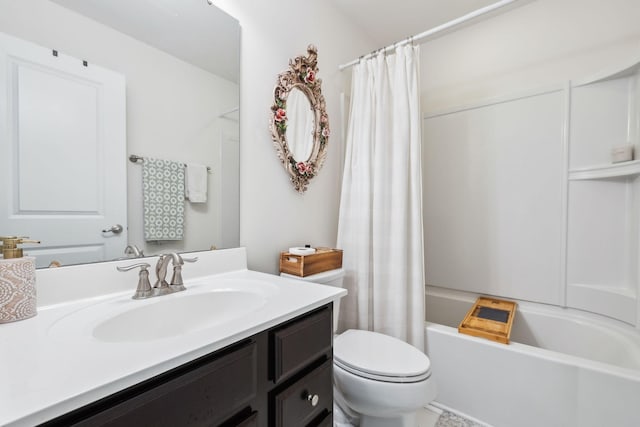 full bath with toilet, vanity, and shower / tub combo