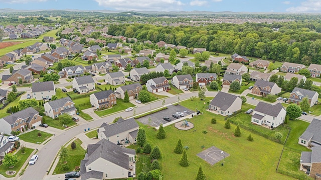 aerial overview of property's location with nearby suburban area