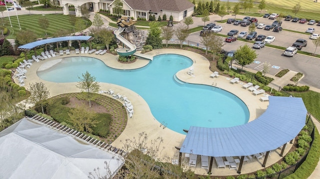 community pool with a water slide