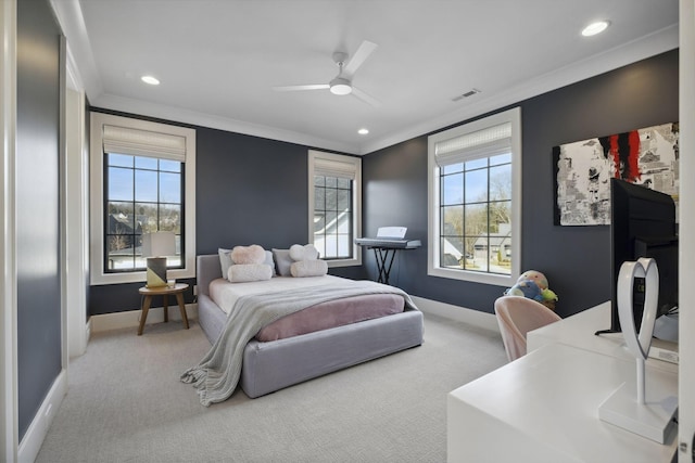carpeted bedroom with ornamental molding, baseboards, recessed lighting, multiple windows, and ceiling fan