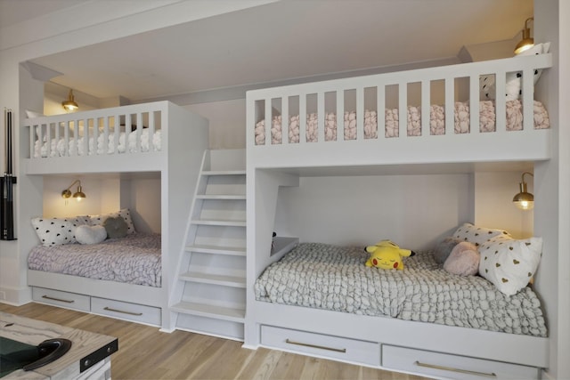 bedroom featuring wood finished floors