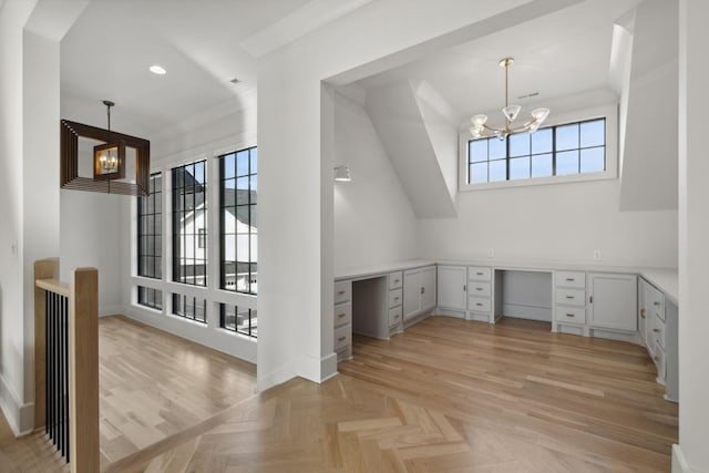 unfurnished office with a chandelier, built in study area, recessed lighting, and baseboards