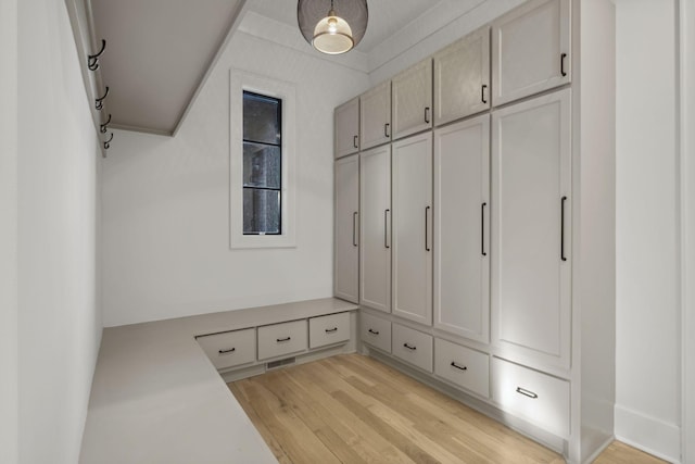 mudroom with light wood-style floors