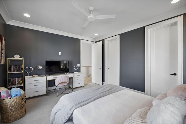 bedroom featuring light carpet, ornamental molding, recessed lighting, a desk, and a ceiling fan