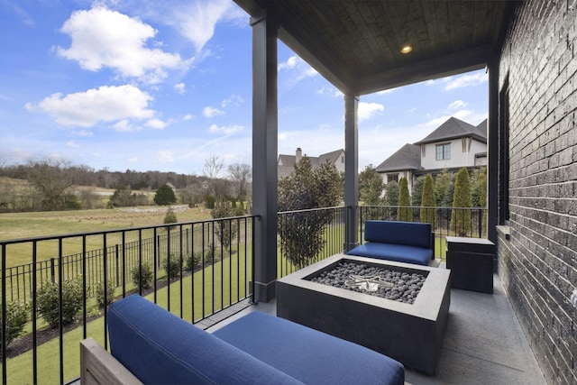 balcony with an outdoor fire pit