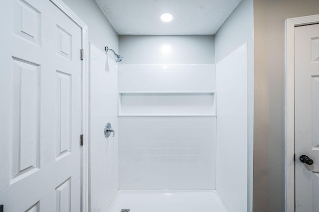 204 Wilson Ave, Auburn, KY 42206 - full bath featuring a stall shower and a textured ceiling