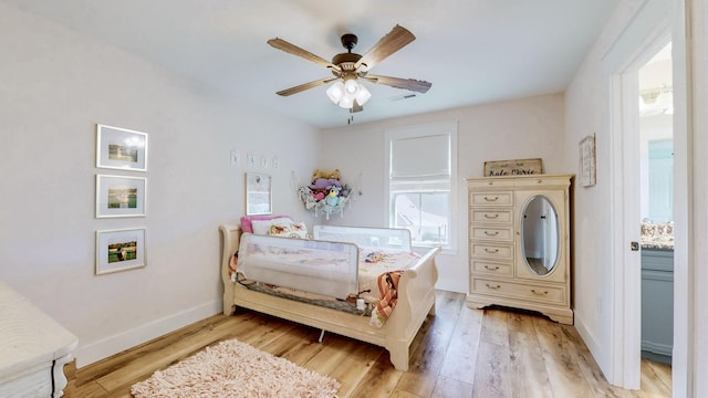 548 Buddy Rd, Burns, TN 37029 - bedroom featuring light wood-style floors, baseboards, and ceiling fan