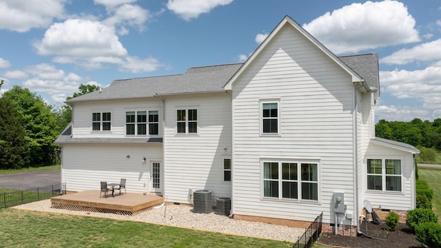 548 Buddy Rd, Burns, TN 37029 - back of property with a deck, central AC unit, a shingled roof, and crawl space