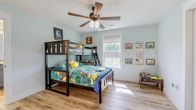 548 Buddy Rd, Burns, TN 37029 - bedroom with light wood finished floors, baseboards, and a ceiling fan