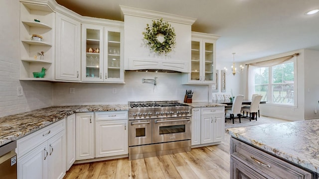548 Buddy Rd, Burns, TN 37029 - kitchen with stainless steel appliances, white cabinetry, light wood-style flooring, and recessed lighting