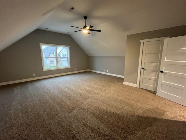 614 Woodrush Dr, Clarksville, TN 37040 - additional living space with carpet, baseboards, a ceiling fan, and lofted ceiling
