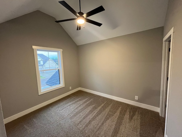 614 Woodrush Dr, Clarksville, TN 37040 - spare room with ceiling fan, lofted ceiling, dark colored carpet, and baseboards