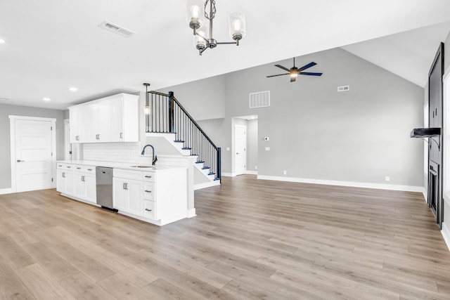 614 Woodrush Dr, Clarksville, TN 37040 - kitchen featuring dishwasher, ceiling fan, open floor plan, light countertops, and a peninsula