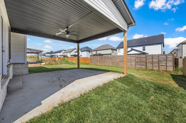 614 Woodrush Dr, Clarksville, TN 37040 - fenced backyard featuring a residential view, a patio, and a ceiling fan