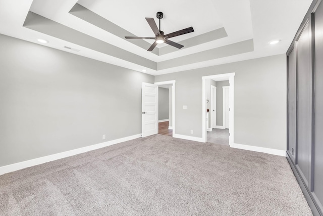 614 Woodrush Dr, Clarksville, TN 37040 - unfurnished bedroom featuring a raised ceiling, carpet, recessed lighting, and ceiling fan