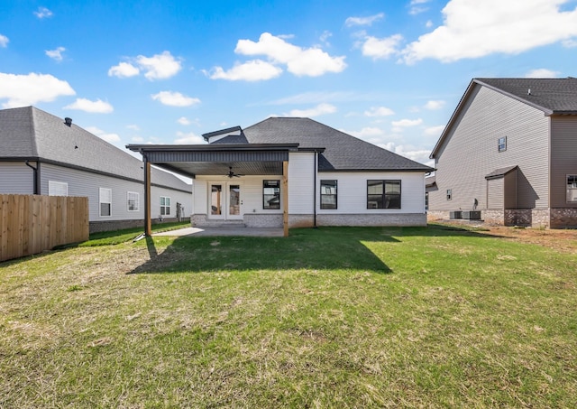 614 Woodrush Dr, Clarksville, TN 37040 - rear view of house featuring ceiling fan, a patio area, and roof with shingles
