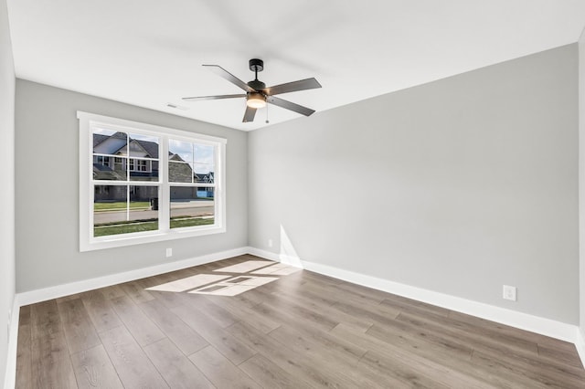 614 Woodrush Dr, Clarksville, TN 37040 - unfurnished room with wood finished floors and a ceiling fan