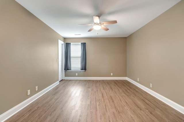 1317 Sam Houston Ave, Murfreesboro, TN 37129 - unfurnished room with ceiling fan, wood finished floors, and baseboards