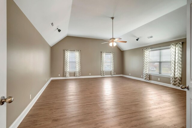 1317 Sam Houston Ave, Murfreesboro, TN 37129 - spare room with ceiling fan, vaulted ceiling, wood finished floors, and baseboards