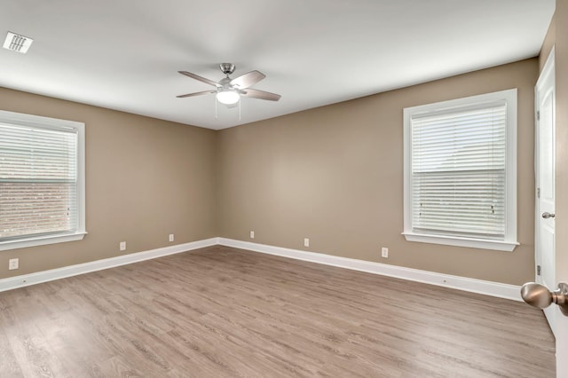 1317 Sam Houston Ave, Murfreesboro, TN 37129 - empty room featuring a ceiling fan, wood finished floors, and baseboards
