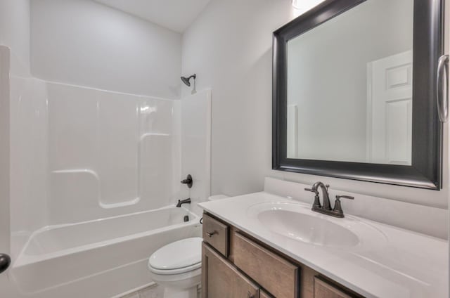 full bath featuring toilet, vanity, and bathtub / shower combination