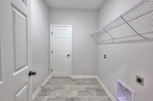 laundry room featuring electric dryer hookup, baseboards, and hookup for a washing machine
