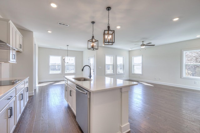 kitchen featuring a sink, stainless steel dishwasher, baseboards, black electric cooktop, and recessed lighting
