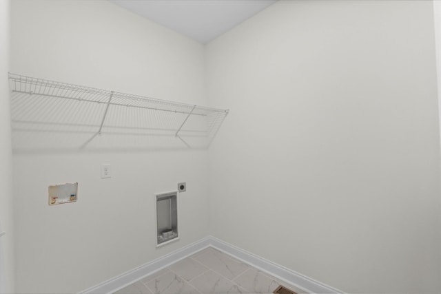 1 Shelton Ferry Rd, Southside, TN 37171 - clothes washing area with washer hookup, electric dryer hookup, baseboards, and light marble finish floors