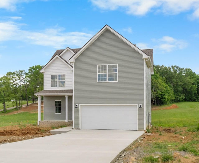 1 Shelton Ferry Rd, Southside, TN 37171 - view of front of house featuring an attached garage and concrete driveway