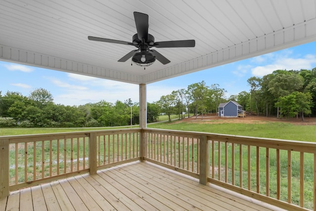 1 Shelton Ferry Rd, Southside, TN 37171 - deck featuring ceiling fan, a lawn, and view of scattered trees