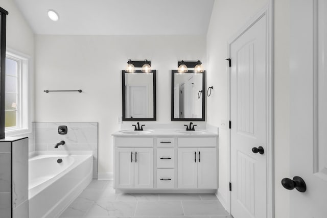 1 Shelton Ferry Rd, Southside, TN 37171 - full bathroom featuring a garden tub, double vanity, and marble finish flooring